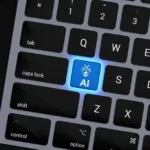 a-close-up-of-a-keyboard-with-a-blue-button